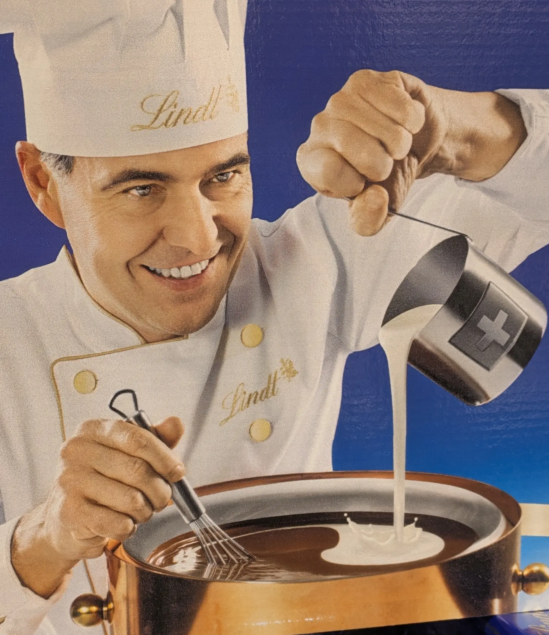 lindt chocolate guy mixing milk
